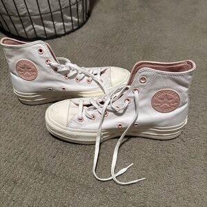 White and pink platform converse